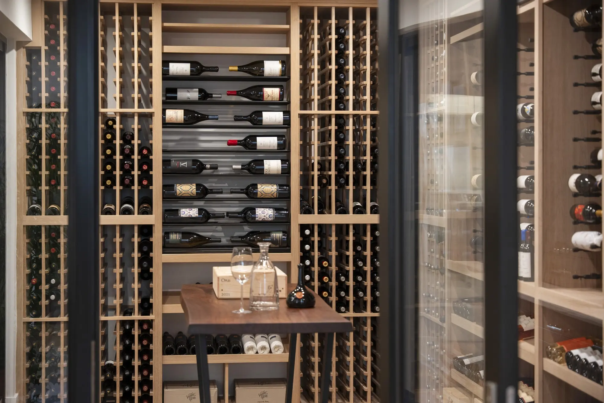 Backyard patio with stone hardscaping and mature landscaping