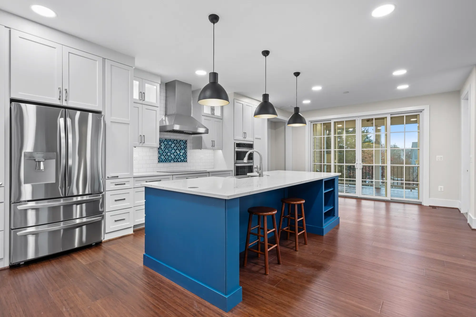 Modern kitchen with blue island in Falls Church rental