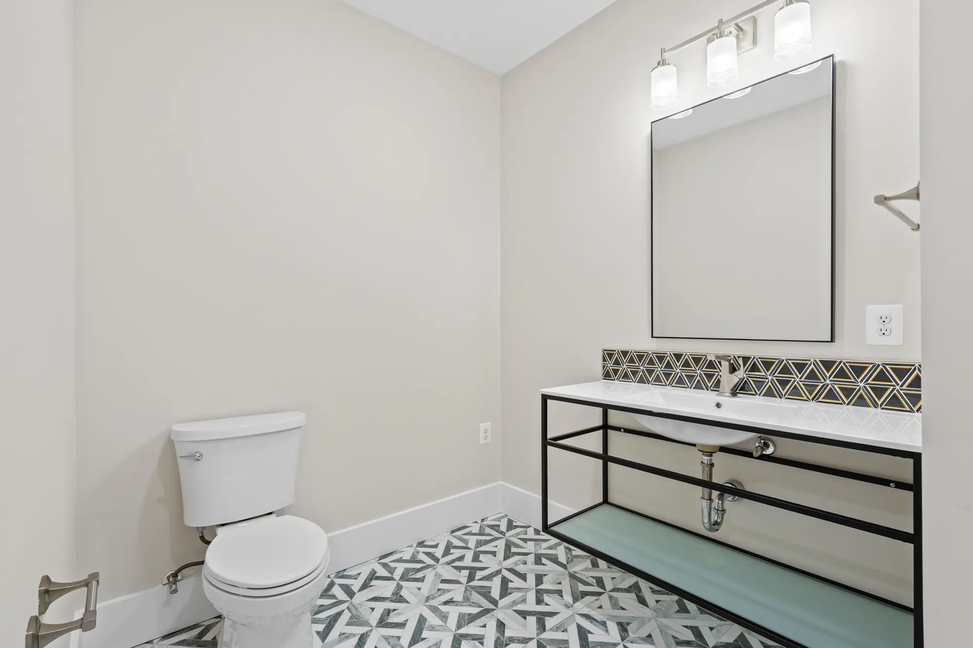 Large walk-in closet with built-in shelving and clothing rods
