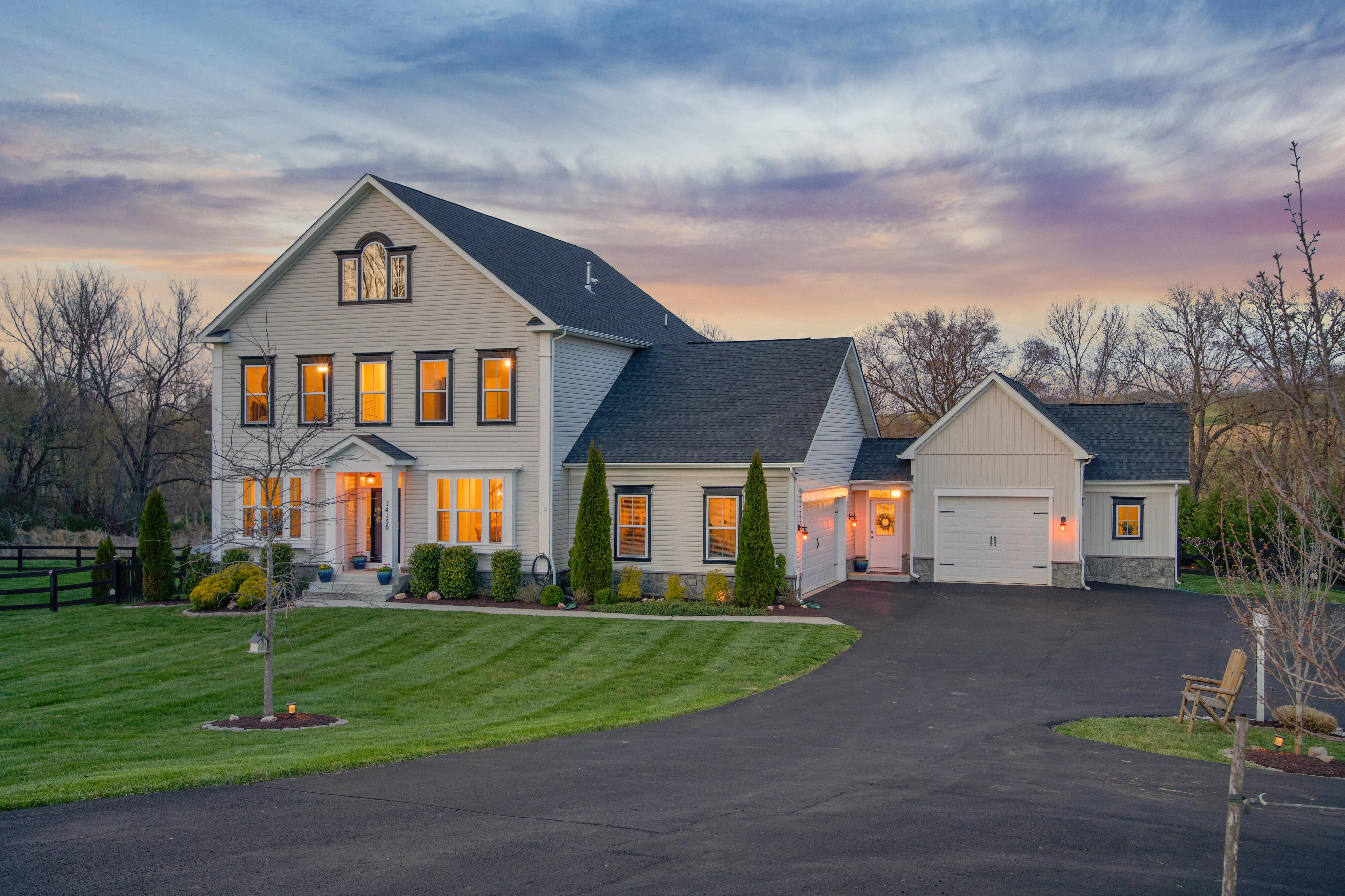 Elegant master bedroom with designer furnishings and natural light