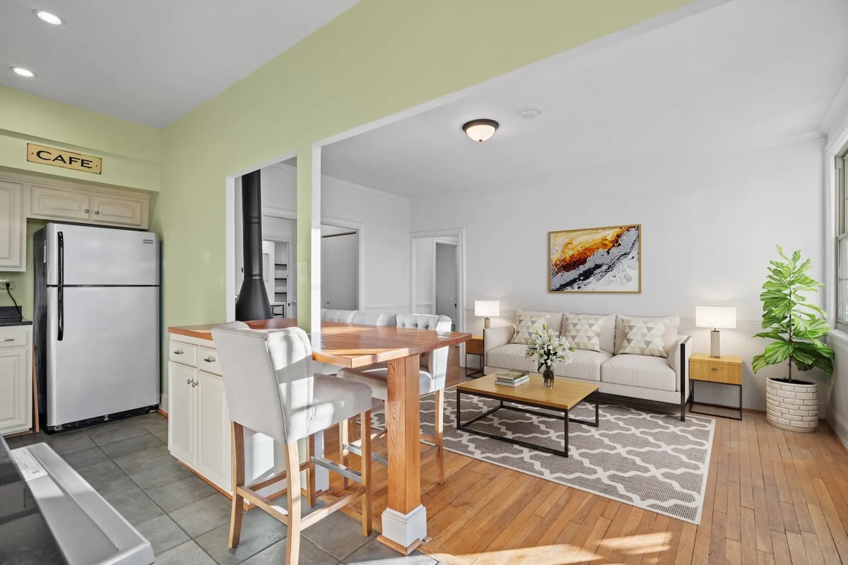 Kitchen and living area with staged furniture — after virtual staging
