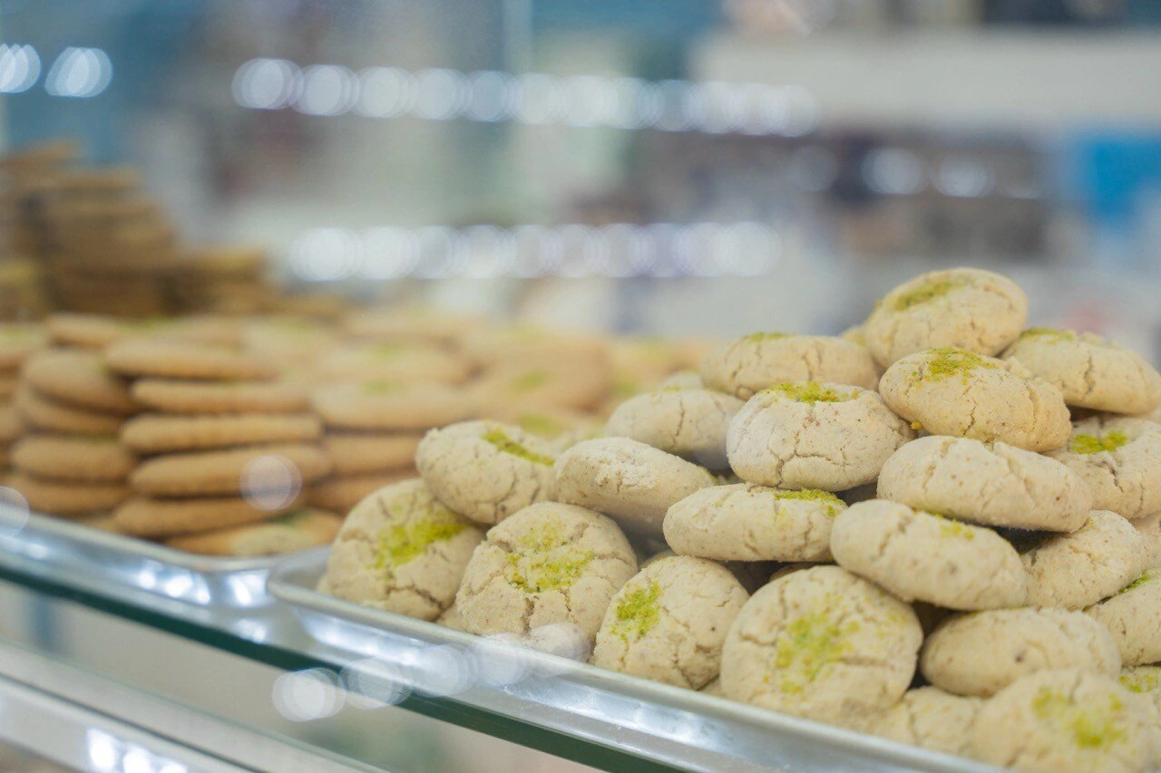 Construction site photography — workers and caution tape on active site